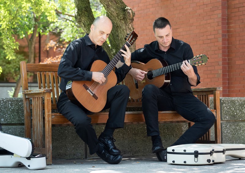 GRCC Music professors Jonathan Marshall and Brian Morris performing at Festival of the Arts as